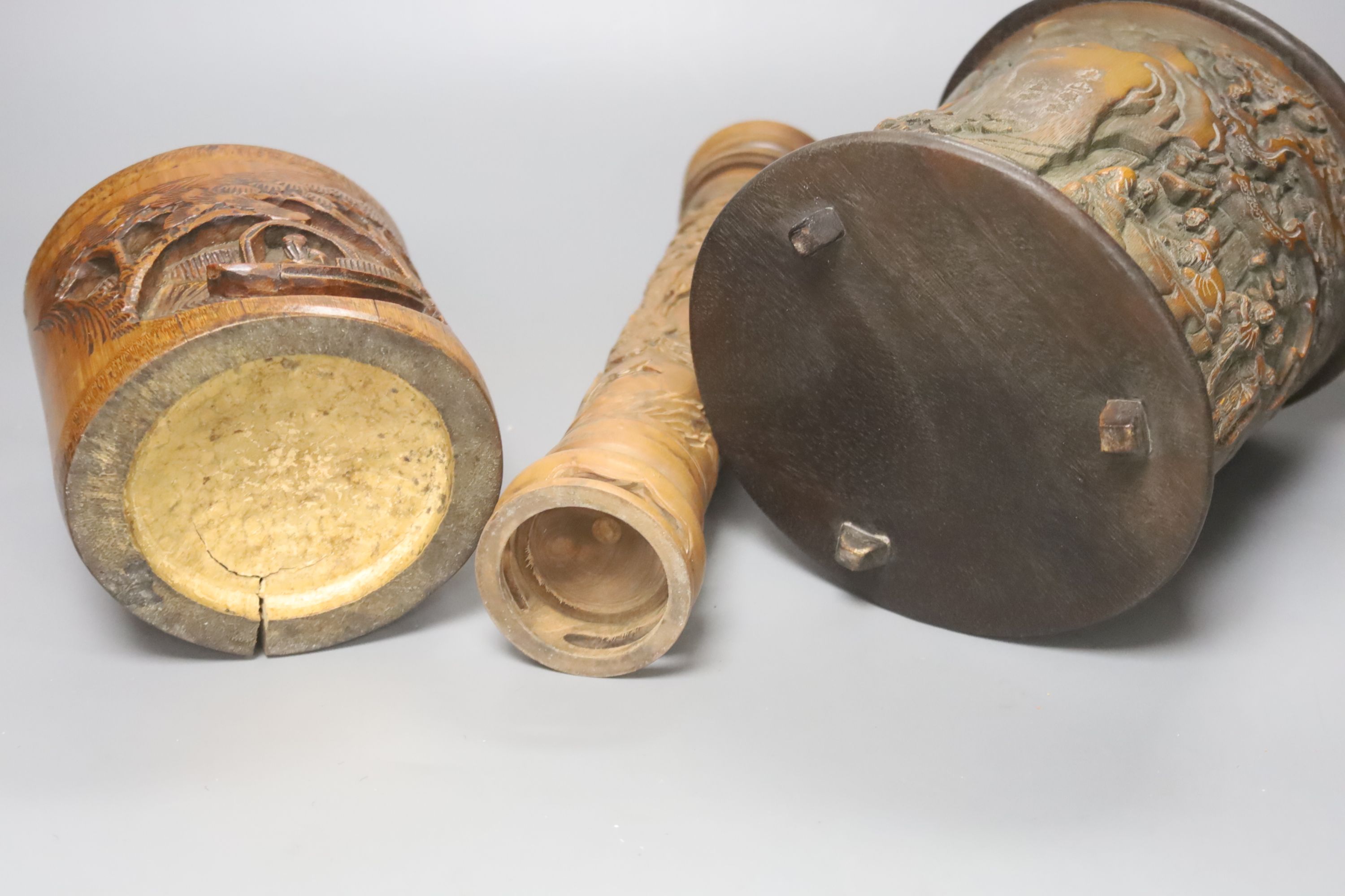 Three Chinese carved bamboo brushpots, largest 16cm diameter 17cm high, together with a carved bamboo scroll box and a carved hardwood plate stand (6)